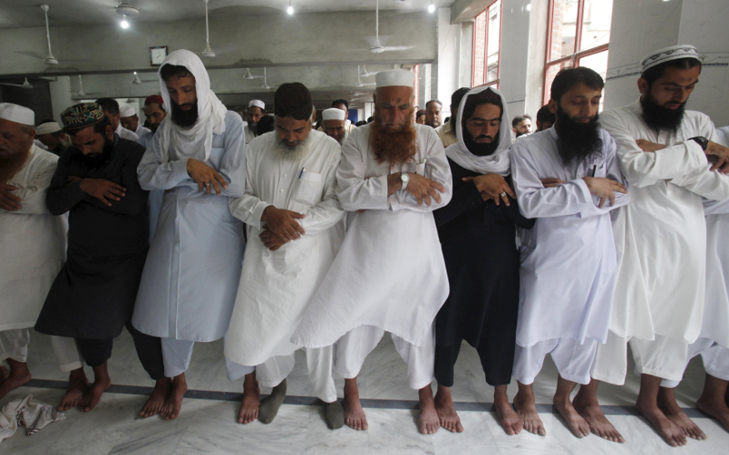 Men offer funeral prayers for the late Taliban supreme leader Mullah Omar at Jamia Masjid Khyber in Peshawar, Pakistan July 31, 2015. u00e2u20acu201d Reuters pic