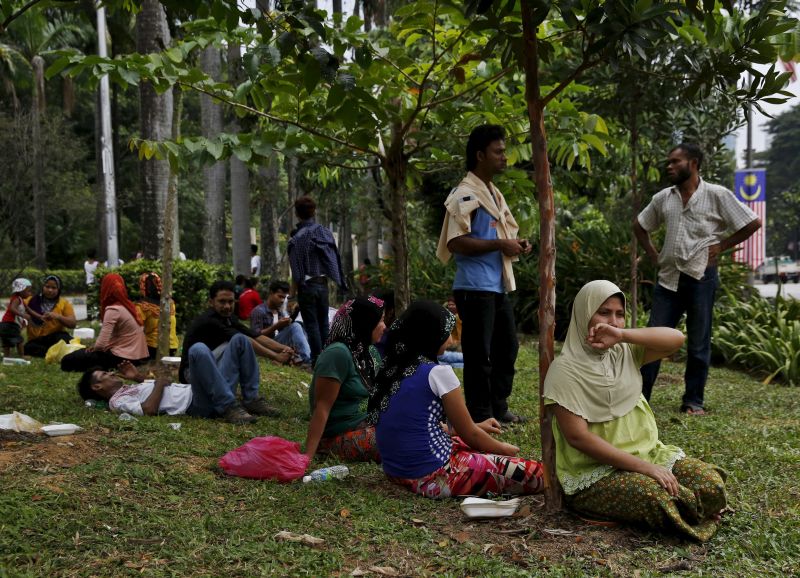 Refugees, many of whom say they are Rohingya, wait for access to the United Nations High Commission for Refugees (UNHCR) building in Kuala Lumpur, Malaysia. Picture released August 12, 2015. u00e2u20acu2022 Reuters pic