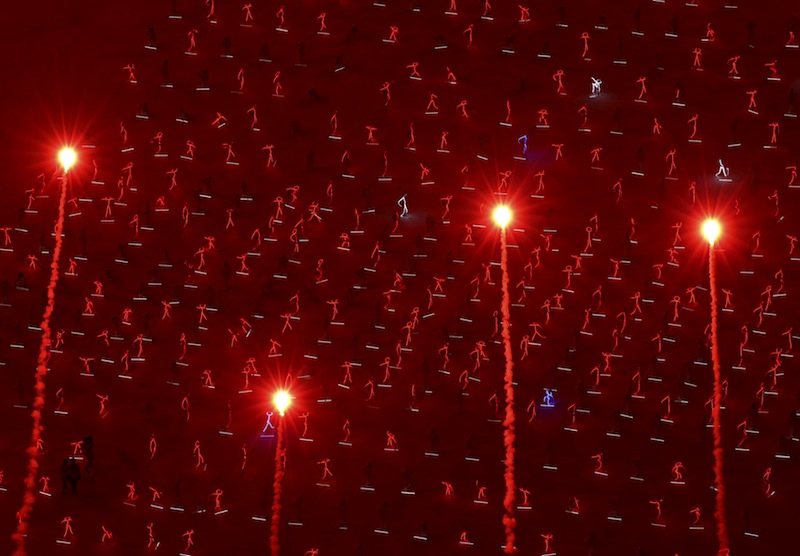 Fireworks explode as children performers wearing LED-lit costumes dance during a Golden Jubilee celebration parade rehearsal in Singapore August 1, 2015. u00e2u20acu201d Reuters pic