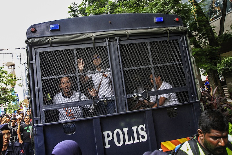 Protesters being arrested during #TangkapNajib rally at Sogo in Kuala Lumpur, August 1, 2015. u00e2u20acu201d Picture by Yusof Mat Isa 