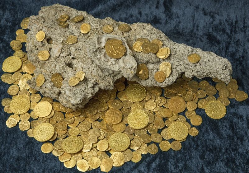 Over 350 gold coins from a sunken Spanish Treasure are seen in an undated handout picture courtesy of 1715 Fleet u00e2u20acu201d Queens Jewels. u00e2u20acu201d Reuters pic
