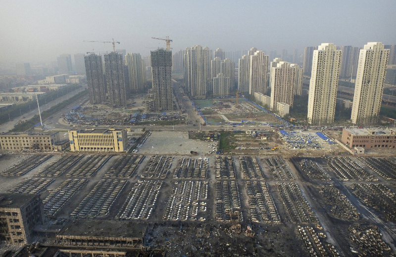 An aerial picture shows damaged cars at the site of Wednesday night's explosions at Binhai new district in Tianjin, China, August 15, 2015. u00e2u20acu201d Reuters pic