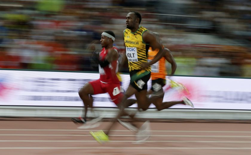 Mike Rodgers of the US (left) and Usain Bolt of Jamaica (centre) competes in the menu00e2u20acu2122s 100 metres heats during the 15th IAAF World Championships at the National Stadium in Beijing, China August 22, 2015. u00e2u20acu201d Reuters pic
