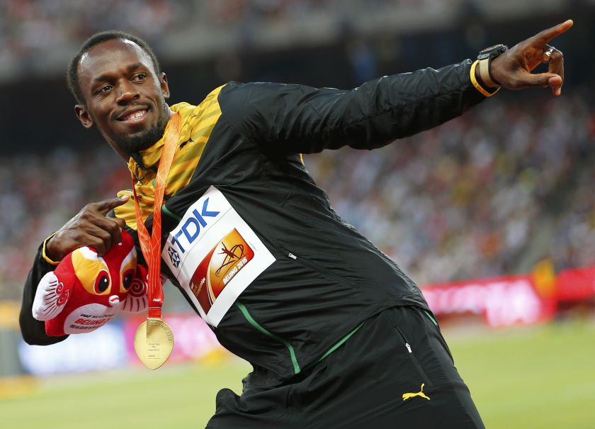 Usain Bolt of Jamaica, gold medal, reacts as he poses on the podium after the menu00e2u20acu2122s 200 metres event during the 15th IAAF World Championships at the National Stadium in Beijing, China, August 28, 2015. u00e2u20acu201d Reuters pic