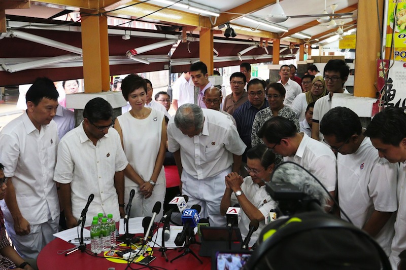 Current and incoming PAP candidates for Bishan Toa Payoh GRC pay their respects to Wong Kan Seng, who will be not be running in the upcoming General Election, during a press conference on August 12, 2015.u00c2u00a0u00e2u20acu201du00c2u00a0TODAY pic