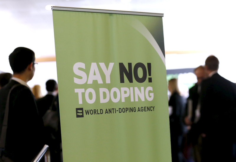 Participants talk before the start of the World Anti-Doping Agency (WADA) Symposium for Anti-Doping Organisations in Lausanne, in this March 24, 2015 file photo. u00e2u20acu201d Reuters pic
