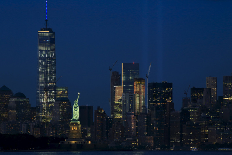 The Tribute in Light is illuminated next to the Statue of Liberty (centre) and One World Trade Centre (left) during events marking the 14th anniversary of the 9/11 attacks on the World Trade Centre in New York September 11, 2015. u00e2u20acu201d Reuters pic