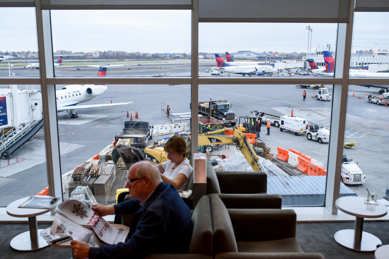 Travellers at Terminal C of La Guardia Airport, where Delta Air Lines was making improvements last year in New York, December 5, 2014. u00e2u20acu201dKarsten Moran/The New York Times pic