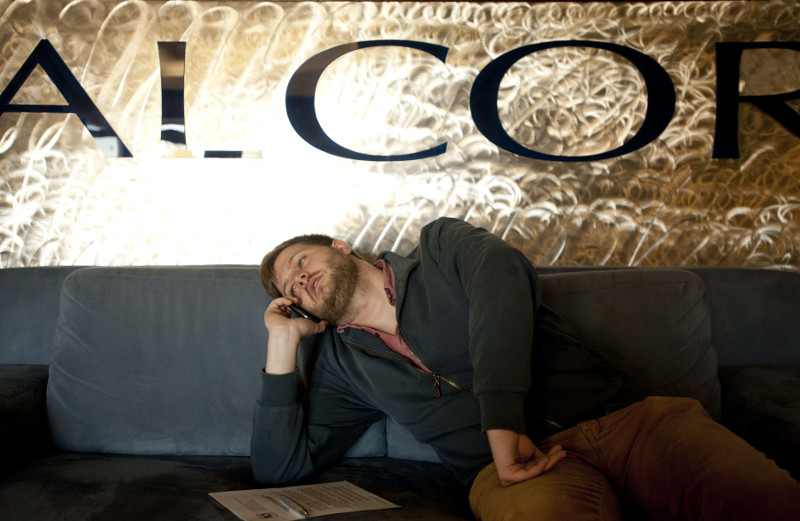 Josh Schisler talks on the phone in the lobby as the body of his girlfriend, Kim Suozzi, is prepared for cryopreservation at Alcor Life Extension Foundation in Scottsdale, Arizona, January 6, 2013. — Picture by Laura Segall/The New York Times