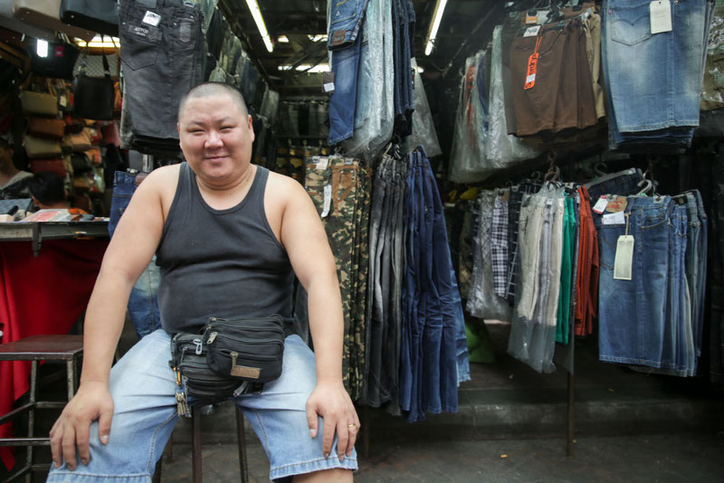 Garment seller Gemuk Jeans is seen in front of his shop at Petaling Street, Kuala Lumpur, 25, Sept 2015, — Picture by Choo Choy May