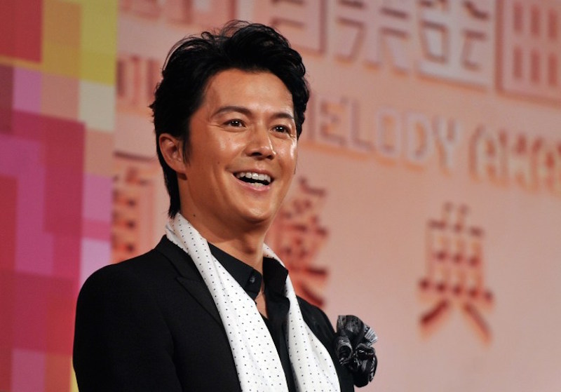 Japanese actor and singer Masaharu Fukuyama poses for photographs upon his arrival at the 24th Golden Melody Awards in Taipei July 6, 2013. u00e2u20acu201d AFP pic
