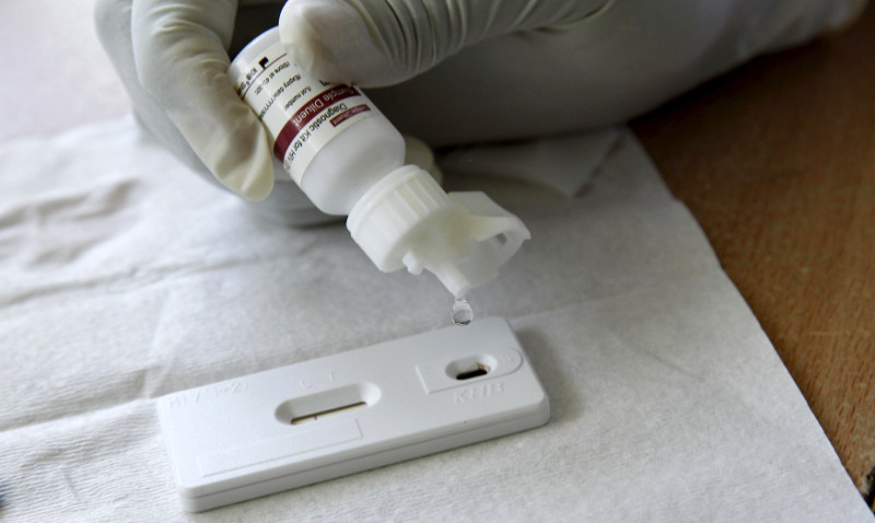 A counsellor adds a reactor to a blood sample from a woman to test for HIV at the Mater Hospital in Kenya's capital Nairobi, September 10, 2015. u00e2u20acu201d Reuters pic