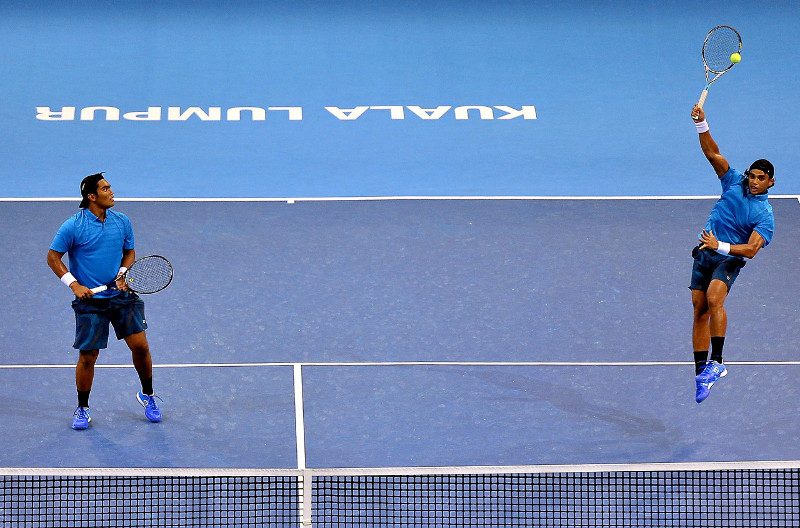 Merzuki Mohd Assri (left) and Syed Naguib Syed Mohd Agil provide stiff competition but eventually lose to doubles Santiago Gonzalez and Philipp Petzschner in the 2015 Malaysia Open tennis tournament at Putra Stadium in Bukit Jalil, Sept 28, 2015. u00e2u20acu201d Bern