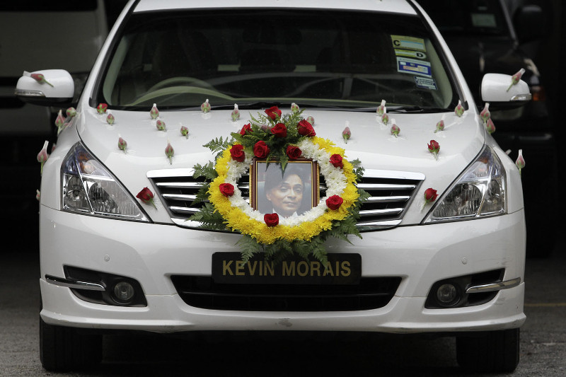 A hearse, bearing the picture of the late Anthony Kevin Morais, is seen at the HKL mortuary in Kuala Lumpur.