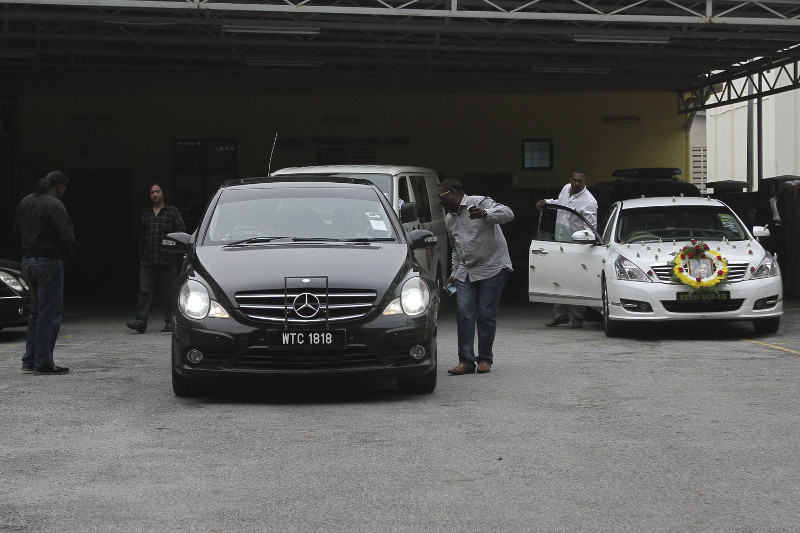 Family members of late Anthony Kevin Morais arrive at at the HKL mortuary in Kuala Lumpur.