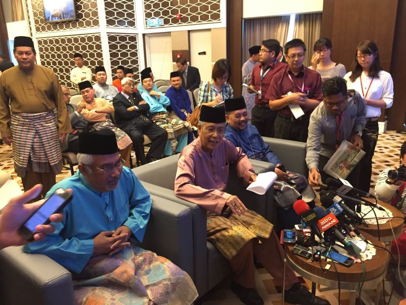 Election Commission chairman Tan Sri Abdul Aziz Mohd Yusof (seated, centre) speaking to reporters after launching EC's 58th anniversary. u00e2u20acu2022 Picture by Kamles Kumar