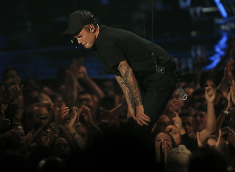 Justin Bieber reacts as he finishes performing a medley of songs at the 2015 MTV Video Music Awards in Los Angeles August 30, 2015. u00e2u20acu201d Reuters pic