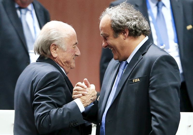 UEFA President Michel Platini (right) congratulates FIFA President Sepp Blatter after he was re-elected at the 65th FIFA Congress in Zurich, in this file picture taken May 29, 2015. u00e2u20acu201d Reuters pic