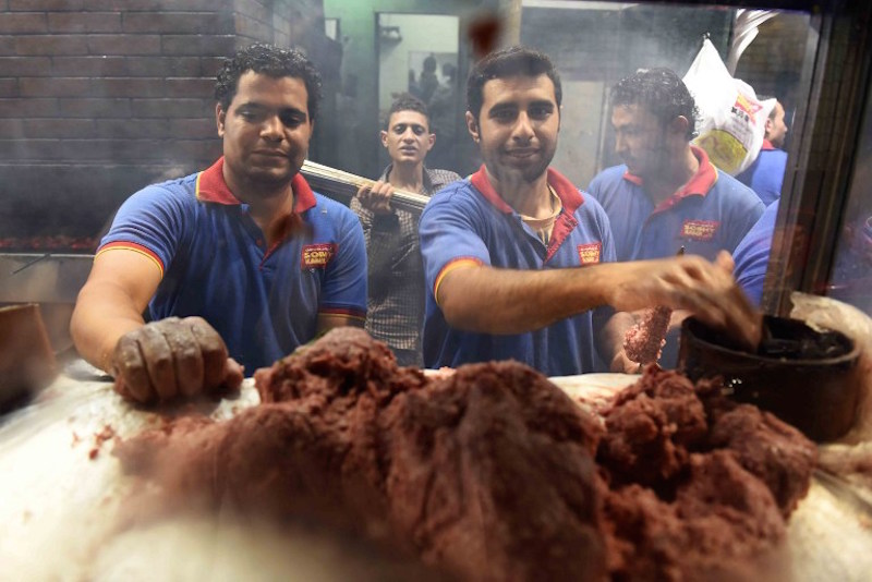 Egyptians prepare meat kebabs at the Kaber Subhi restaurant in Cairou00e2u20acu2122s northern suburb of Shubra, on September 1, 2015. u00e2u20acu201d AFP pic