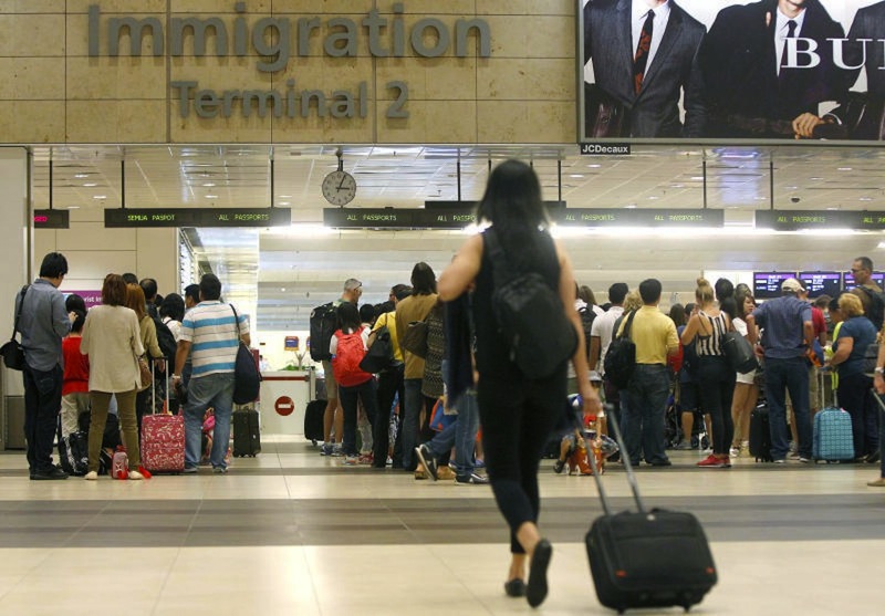 Travellers arriving at the immigration hall at Changi Airport Terminal 2. u00e2u20acu201du00c2u00a0TODAY pic