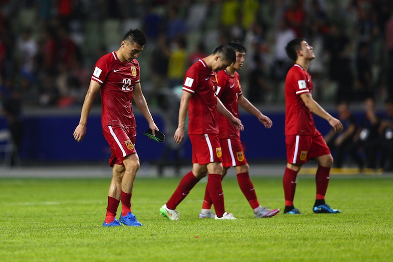 Chinese players walk off the pitch in Shenzhen, south China's Guangdong province after their 2018 World Cup football qualifying match against Hong Kong on September 3, 2015. u00e2u20acu201d AFP pic
