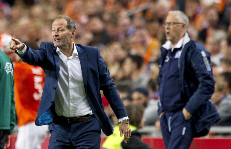 Head coach Danny Blind of the Netherlands (left) reacts while Iceland’s head coach Lars Lagerback of Sweden looks on during their Euro 2016 qualifying match against Iceland in Amsterdam, September 3, 2015. — Reuters pic