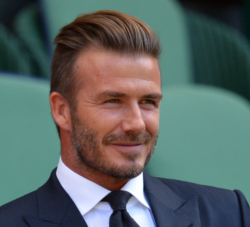 Former England footballer David Beckham sits on centre court to watch the womenu00e2u20acu2122s semi-final matches on day ten of the 2015 Wimbledon Championships at Wimbledon, southwest London, on July 9, 2015. u00e2u20acu201d AFP pic