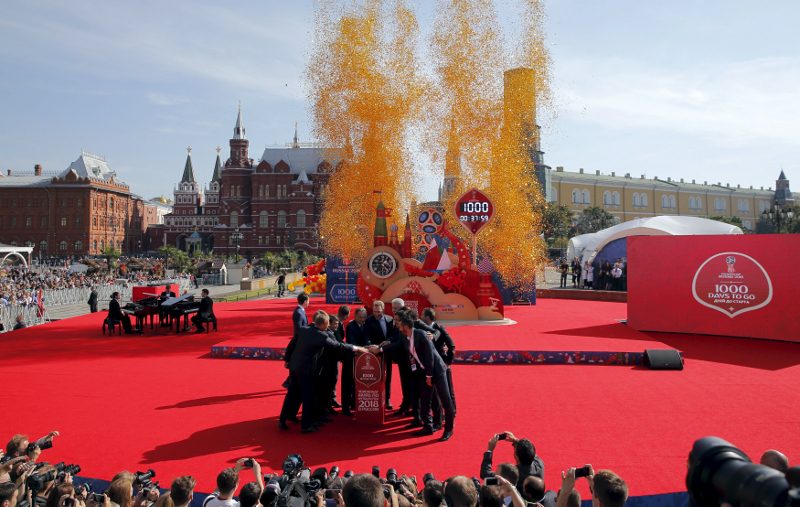 Officials along with former and current football players take part in a ceremony to launch the clock, counting down the 1,000 days to the beginning of the 2018 FIFA World Cup, in Manezhnaya Square, September 18, 2015. u00e2u20acu201d Reuters pic