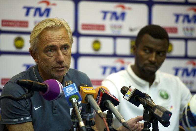 Saudi Arabia coach Bert Van Marwijk (left) with captain Osama Hawsawi at a press conference in Kuala Lumpur September 7, 2015, for their 2018 World Cup qualifiers/AFC Asian Cup 2019 against Malaysia  tomorrow. u00e2u20acu201d Bernama pic