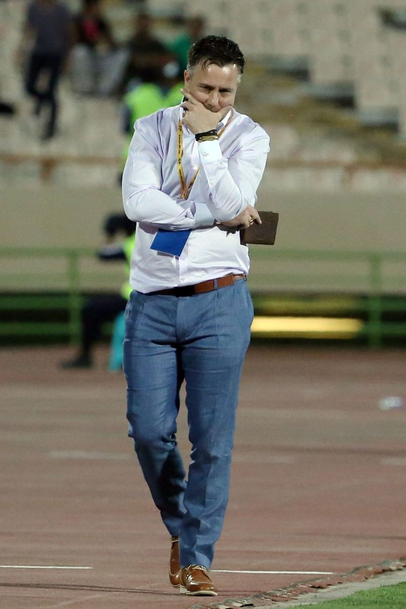 Guamu00e2u20acu2122s British head coach Gary White at their AFC qualifying group D football match for the 2018 FIFA World Cup against Iran at the Azadi stadium in Tehran on September 3, 2015. AFP PHOTO / ATTA KENARE