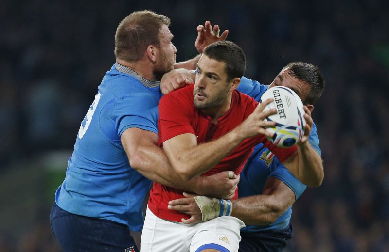 France's Remi Tales tackled by Italy's Lorenzo Cittadini and Quintin Geldenhuys. u00e2u20acu2022 Reuters pic