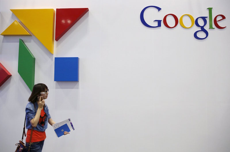 A woman walks past a logo of Google at the Global Mobile Internet Conference (GMIC) 2015 in Beijing, China, in this April 28, 2015 file photo. u00e2u20acu201d Reuters pic