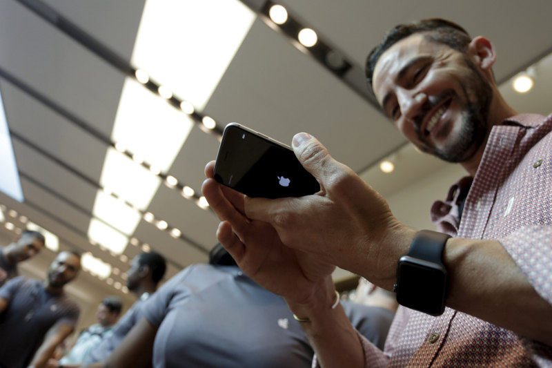 File picture shows a man holding an iPhone 6s Plus as the Apple iPhone 6s and 6s Plus go on sale at an Apple Store in Los Angeles, California September 25, 2015. u00e2u20acu201d Reuters pic