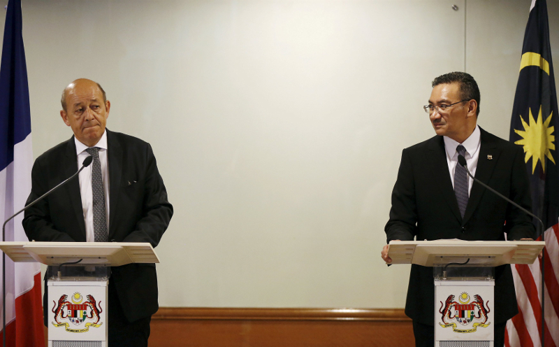 France's Defence Minister Jean-Yves Le Drian (left) and Defence Minister Datuk Seri Hishammuddin Hussein speak to the media about Malaysia's proposed purchase of France's Rafale fighter jets in Kuala Lumpur, September 1, 2015. u00e2u20acu201d Reuters pic