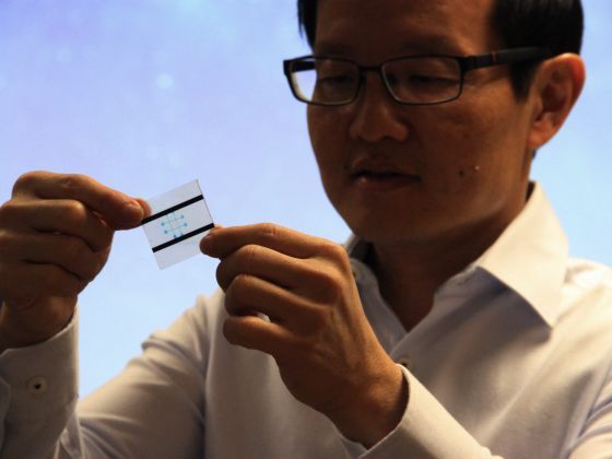 Professor Lim Chwee Teck, National University of Singapore, showing a wearable liquid-based microfluidic tactile sensor, September 23, 2015. Photo: TODAY/Daryl Kang