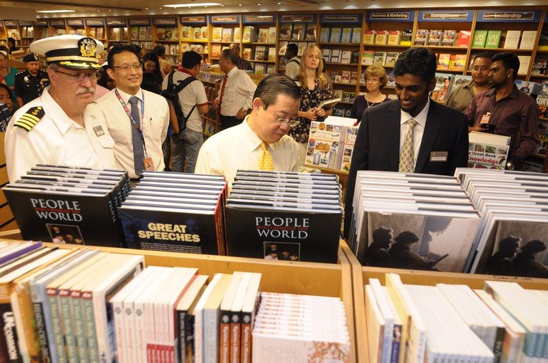 Penang Chief Minister Lim Guan Eng looking at some book on the Logos Hope in Penang on September 4, 2015. u00e2u20acu201dPictures by KE Ooi