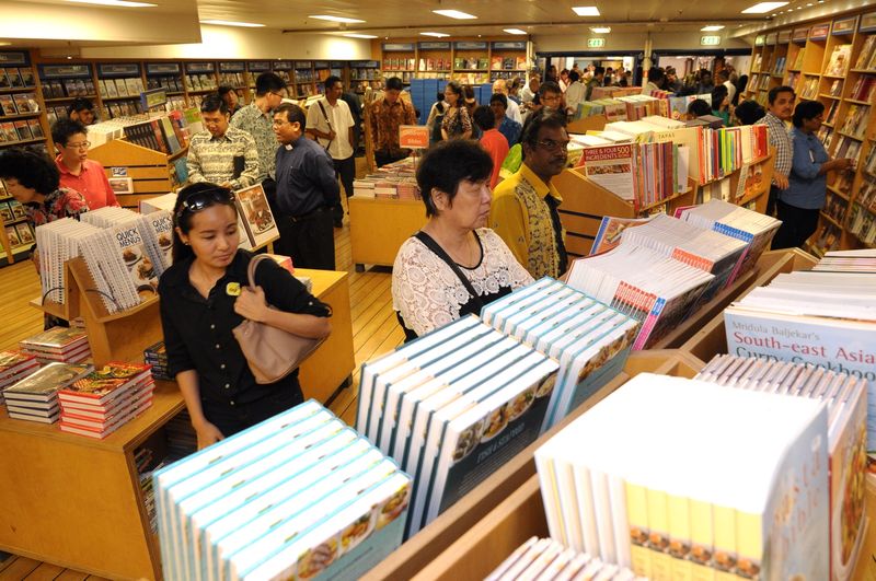 Visitor browsing various type of book on the Logos Hope book ship in Penang on September 4, 2015.