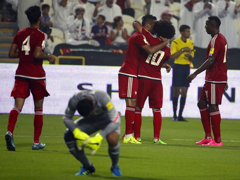 UAE's players celebrate after scoring a goal against Malaysia's team during their AFC qualifying football match for the 2018 FIFA World Cup at the Mohammed Bin Zayed Stadium in Abu Dhabi on September 3, 2015. u00e2u20acu201d AFP pic