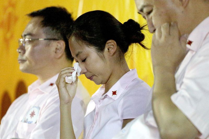 Kevryn Lim wipes her tears after her speech at the NSP rally on Sept 7, 2015. u00e2u20acu201d TODAY pic