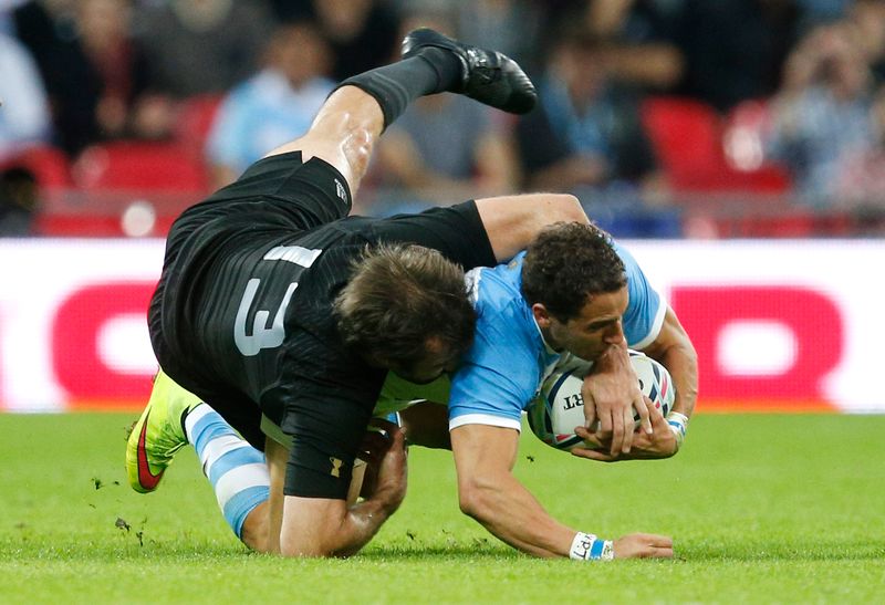 New Zealand's Conrad Smith in action with Argentina's Joaquin in the World Cup rugby match at Wembley Stadium, London, September 20, 2015. u00e2u20acu201d Reuters pic