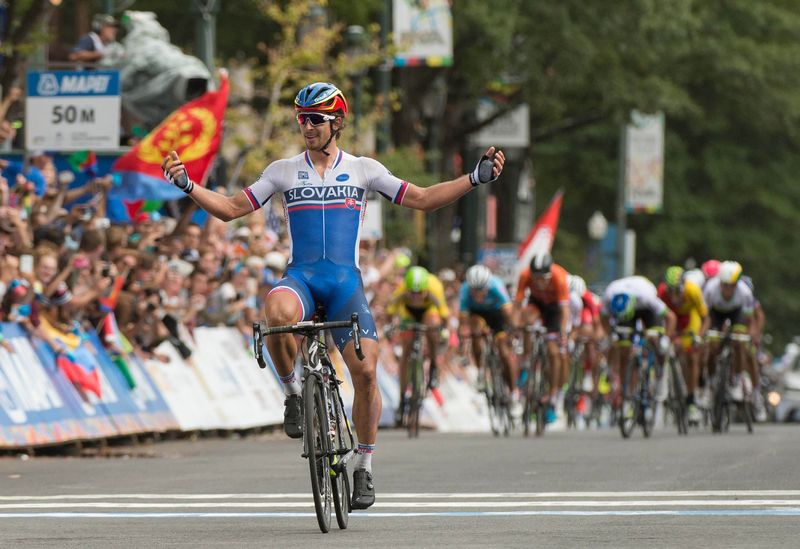 Peter Sagan raises his hands in victory as he crosses the finish line in the UCI road cycling world championships at Richmond Road Circuit, September 27, 2015. u00e2u20acu201d Reuters pic