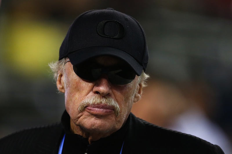 Co-founder and chairman of Nike Inc Phil Knight looks on before the College Football Playoff National Championship Game at AT&T Stadium on January 12, 2015 in Arlington, Texas. u00e2u20acu201d AFP picnnn