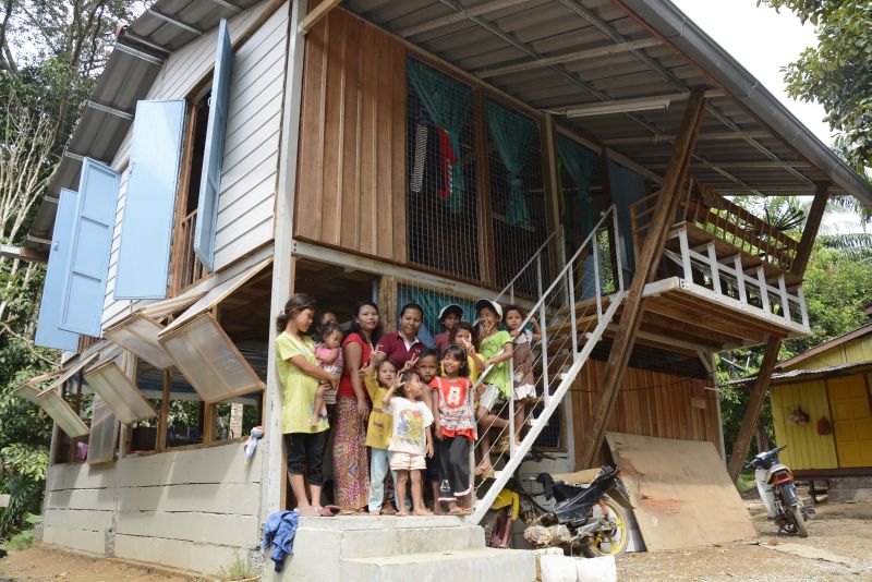 Part of the Orang Asli community in Kg Teranik, Gua Musang at one of the three houses built by EPIC Homes.