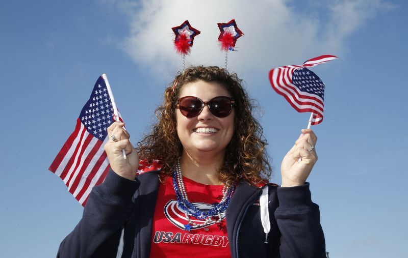 A US fan outside the stadium before the match. 