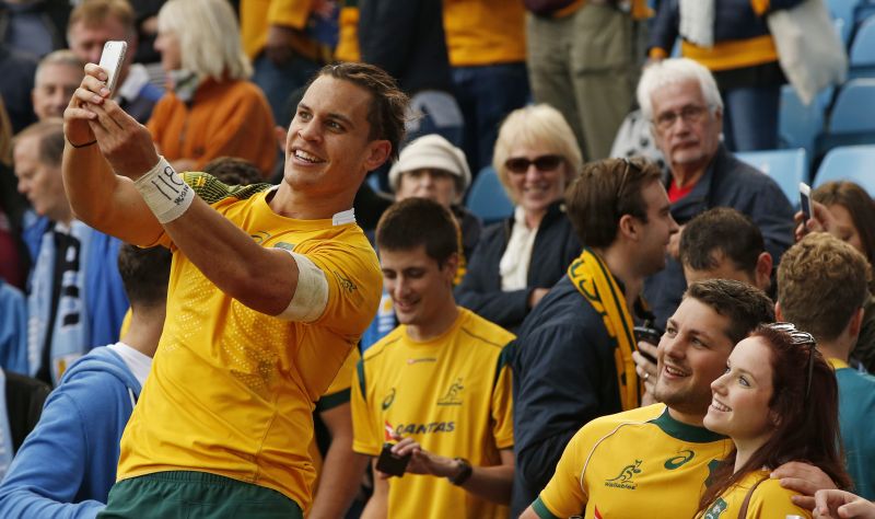 Rugby Union - Australia v Uruguay - IRB Rugby World Cup 2015 Pool A - Villa Park, Birmingham, England - 27/9/15 Australiau00e2u20acu2122s Matt Toomua takes a selfie with fans after the game Action Images via Reuters / Andrew Boyers Livepic