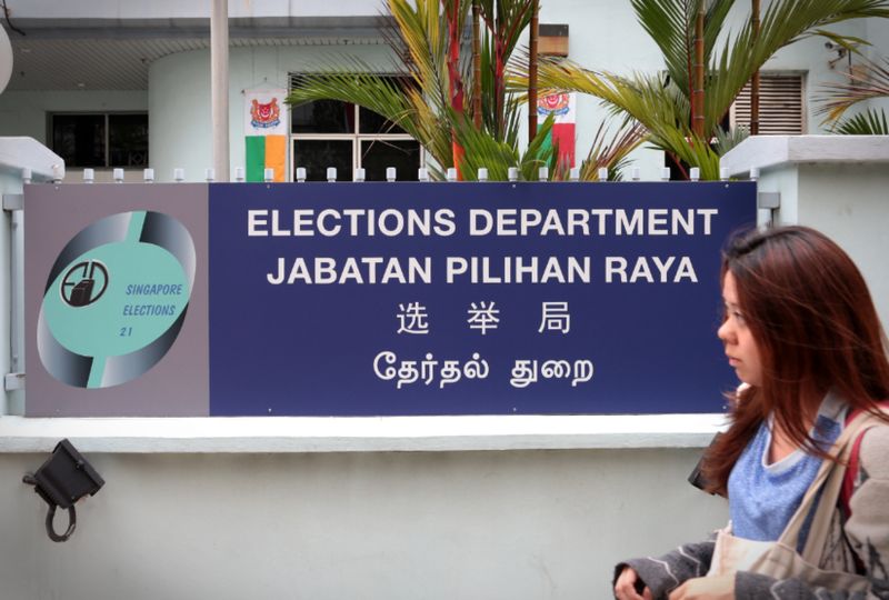 A member of the public walks past the Elections Department. u00e2u20acu201d TODAY pic 