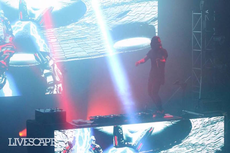 Skrillex dances on the DJ console. — Livescape pic via TheHive.Asia