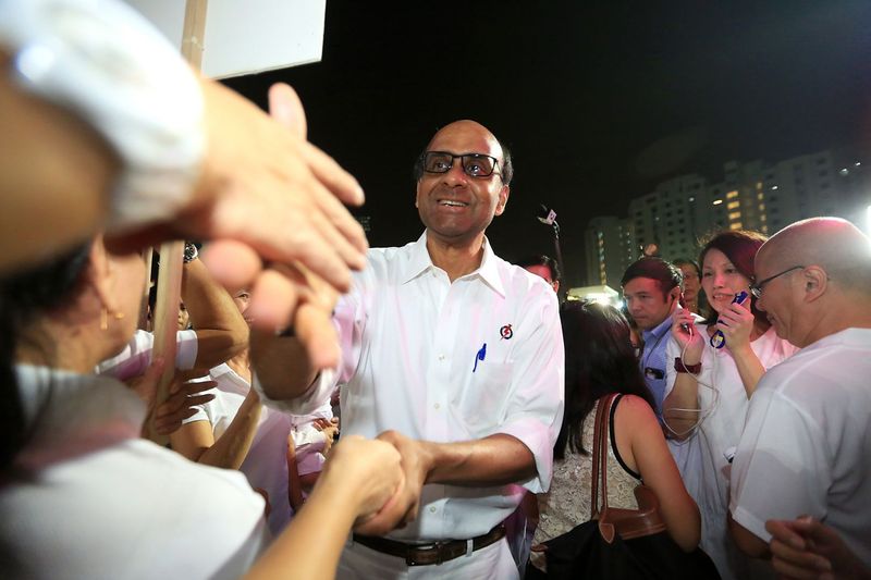 Tharman Shanmugaratnam greeting supporters at Jurong West Stadium in Singapore, September 11, 2105. His Jurong GRC team won with the highest vote share of 79.28 per cent. u00e2u20acu201d TODAY pic