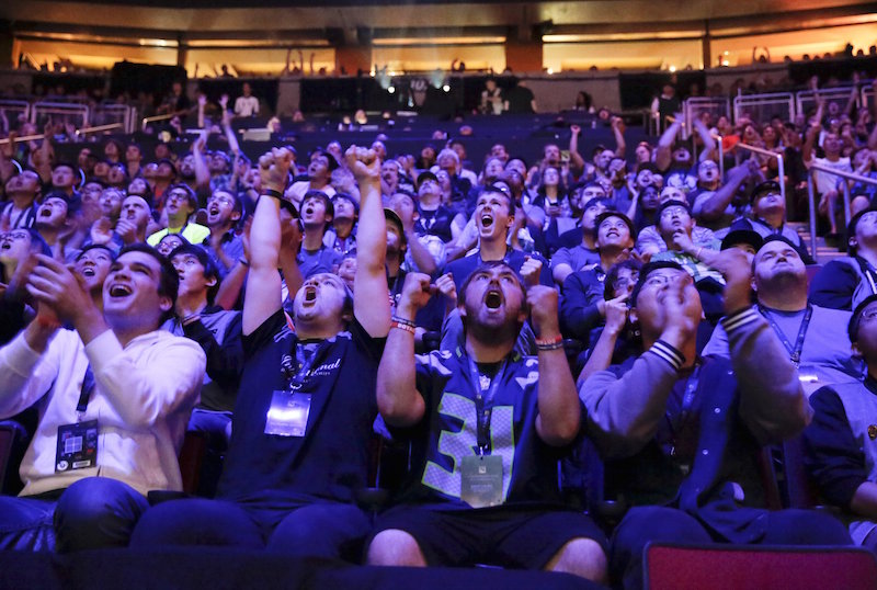 Fans react during The International Dota 2 Championships at Key Arena in Seattle, Washington August 8, 2015. u00e2u20acu201d Reuters pic