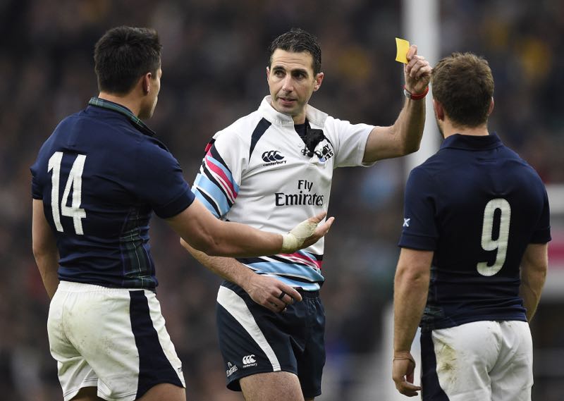 Scotland's wing Sean Maitland (left) receives a yellow card from South African Craig Joubert (centre) during a quarter final match of the 2015 Rugby World Cup between Australia and Scotland at Twickenham stadium, on October 18, 2015. u00e2u20acu201d AFP pic